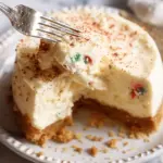 Fork inserted into sugar cookie cheesecake. 5 from 6 reviews Sugar Cookie Cheesecake